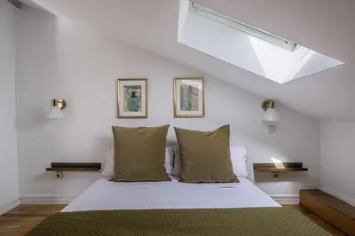 Cama o camas de una habitación en Waou Puerta del Sol II - Alquiler Corta Duración