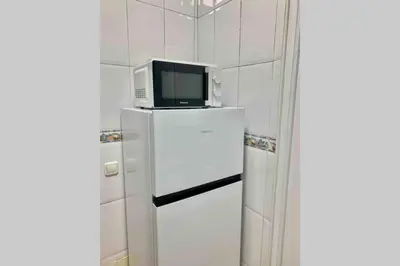 Una cocina o zona de cocina en Precioso Apartamento Madrid Centro