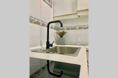 Una cocina o zona de cocina en Precioso Apartamento Madrid Centro