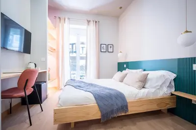 Cama o camas de una habitación en OLBLANC Plaza de España by Batuecas