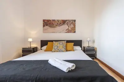 Cama o camas de una habitación en Apartamento Zona Turística Centro Madrid