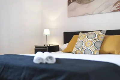 Cama o camas de una habitación en Apartamento Zona Turística Centro Madrid