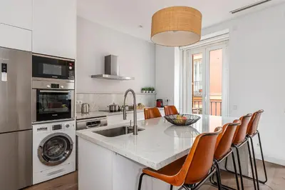 Una cocina o zona de cocina en Waou Puerta del Sol V - Alquiler Corta Duración