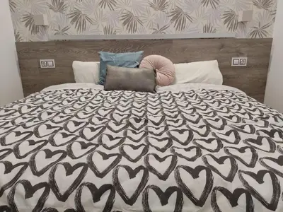Cama o camas de una habitación en Hostal Alfaro