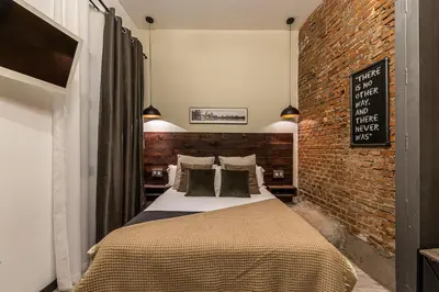 Cama o camas de una habitación en Waou Boutique SOL