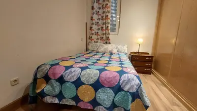 Cama o camas de una habitación en HomeStay Barrionuevo