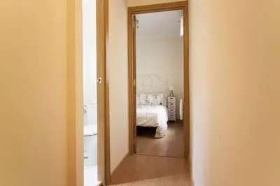 Cama o camas de una habitación en Dos dormitorios al lado del metro centrico moderno