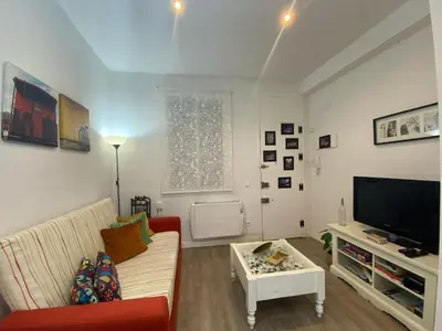 Una televisión o centro de entretenimiento en Piso Espectacular en el Centro de Madrid