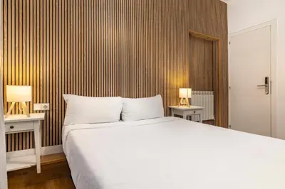 Cama o camas de una habitación en H-A San Mateo Suites