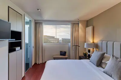 Cama o camas de una habitación en Hyatt Regency Madrid Residences