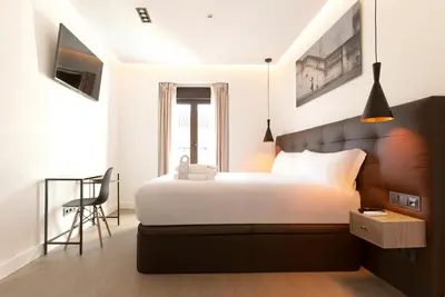 Cama o camas de una habitación en Woohoo Rooms Boutique Sol