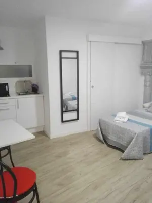 Cama o camas de una habitación en Moderno apartamento en el corazón de Madrid (Sol)
