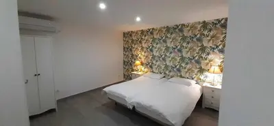 Cama o camas de una habitación en Coqueto Apartamento en el Corazón de Madrid (Sol)