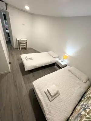 Cama o camas de una habitación en Coqueto Apartamento en el Corazón de Madrid (Sol)