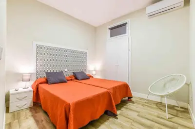Cama o camas de una habitación en Acogedor Apartamento entre Sol, Gran Vía y Palacio