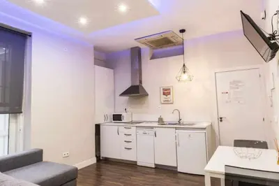 Una cocina o zona de cocina en Céntrico apartamento entre Sol, Ópera y Pza Mayor