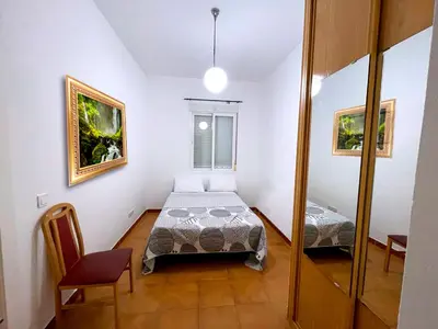Cama o camas de una habitación en Don Quijote APARTAMENTS TPH Madrid