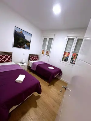 Cama o camas de una habitación en GRAN VIA -Chueca ROOMS PARKING TPH