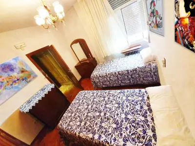 Cama o camas de una habitación en GRAN VIA -Chueca ROOMS PARKING TPH
