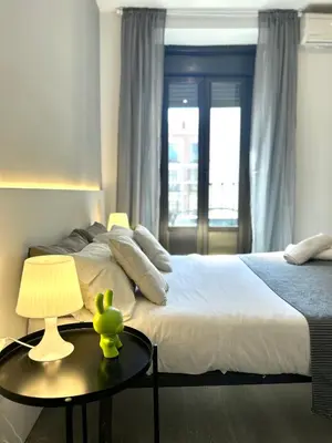 Cama o camas de una habitación en Centric 3ºI
