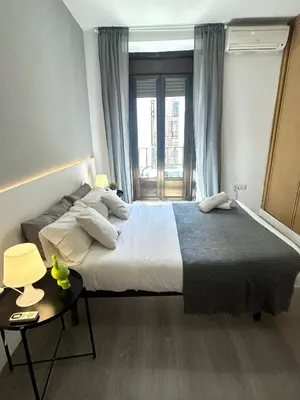 Cama o camas de una habitación en Centric 3ºI