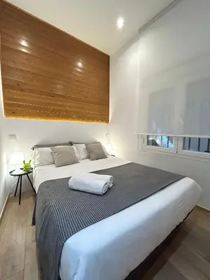 Cama o camas de una habitación en Centric 1ºD