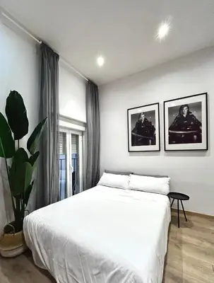 Cama o camas de una habitación en Centric 1ºD