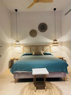 Cama o camas de una habitación en Casa du Soleil Hostal Boutique