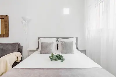 Cama o camas de una habitación en Charming Studio Avenida América