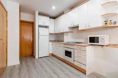 Una cocina o zona de cocina en Charming Studio Avenida América