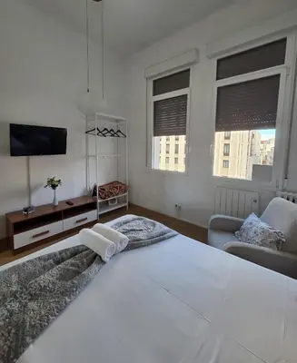 Cama o camas de una habitación en Apartamento en Gran Vía de Madrid 45 4