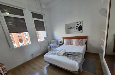 Cama o camas de una habitación en Apartamento en Gran Vía de Madrid 45 4