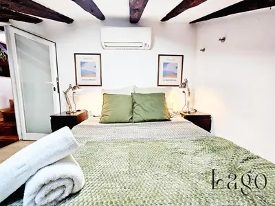 Cama o camas de una habitación en Ático con terraza en el centro de Madrid
