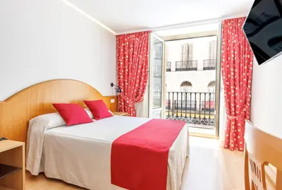 Cama o camas de una habitación en Hotel Europa