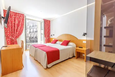 Cama o camas de una habitación en Hotel Europa