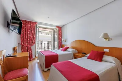 Cama o camas de una habitación en Hotel Europa