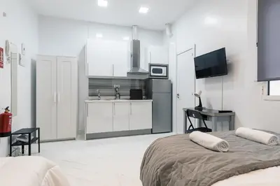 Cama o camas de una habitación en Acogedor estudio en la Calle Encomienda