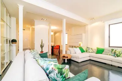 Zona de estar de Caprichoso Loft junto Teatro Real - Madrid Centro by Batuecas