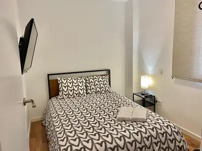 Cama o camas de una habitación en Centro Mirasierra - Metro Usera 01