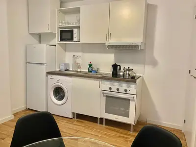 Una cocina o zona de cocina en Centro Mirasierra - Metro Usera 01