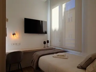 Cama o camas de una habitación en Dobo Marco Polo