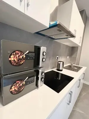 Una cocina o zona de cocina en Hostel Space Capsule
