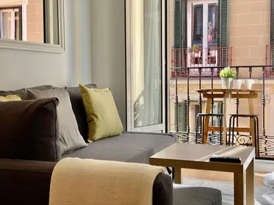 Zona de estar de Valverde Malasaña - Coqueto estudio con sofá cama en el centro