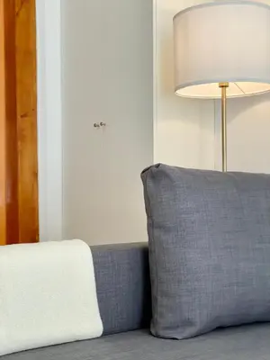 Zona de estar de Valverde Malasaña - Coqueto estudio con sofá cama en el centro