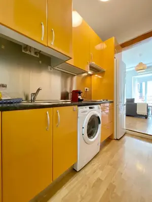 Una cocina o zona de cocina en Valverde Malasaña - Coqueto estudio con sofá cama en el centro