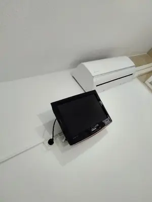 Una televisión o centro de entretenimiento en HOSTAL Noche y Dia