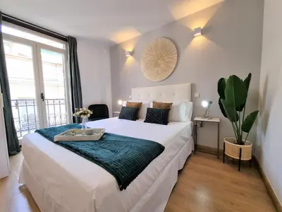 Cama o camas de una habitación en Apartamentos San Isidro