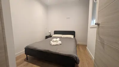 Cama o camas de una habitación en SOL Apartamento Madrid Centro junto a SOL