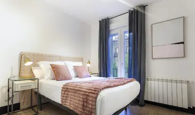 Cama o camas de una habitación en Apartamento Atocha II en Madrid