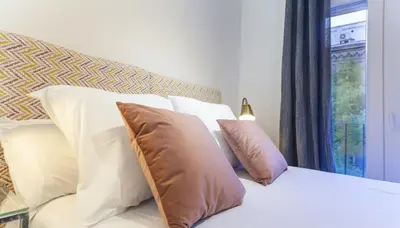 Cama o camas de una habitación en Apartamento Atocha II en Madrid